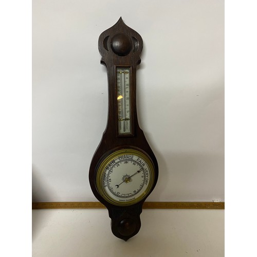 461 - Aneroid Barometer in dark wood surround. 59cms