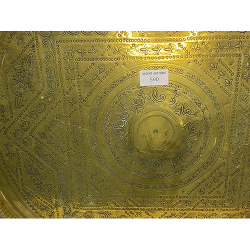 590 - Large brass tray on stand 58cms across.