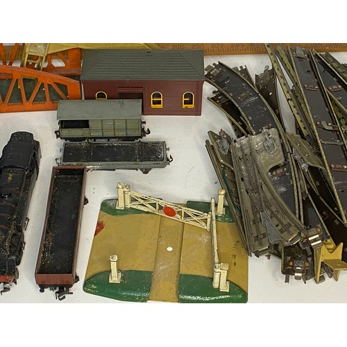 594 - Collection of Hornby Dupio and Triang railway engines, carriages, building and track