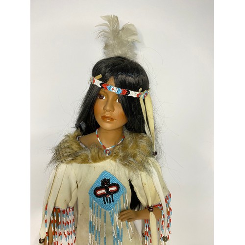 602 - Vintage large porcelain Native American Indian doll on stand and small collectable folk art doll