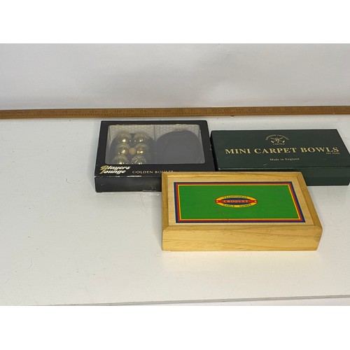 604 - Selection of vintage indoor games including carpet bowls, Golden Boules and Croquet.