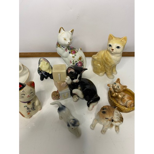 617 - Collection of vintage porcelain cats, plates and Isle of Man cup and saucer.