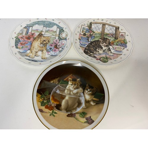 617 - Collection of vintage porcelain cats, plates and Isle of Man cup and saucer.