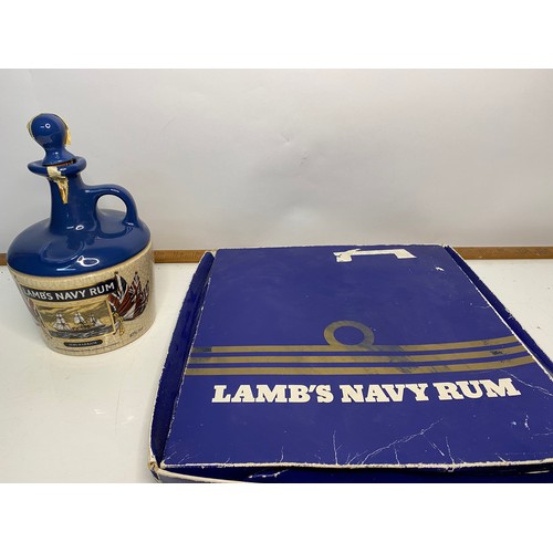 641 - Games compendium and stoneware bottle, both from Lamb's Navy Rum