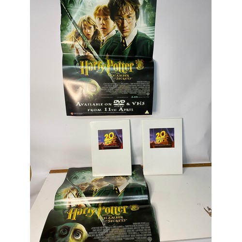 650 - Large number of posters depicting Harry Potter and the Chamber of Secrets. Also 2 movie packs from T... 