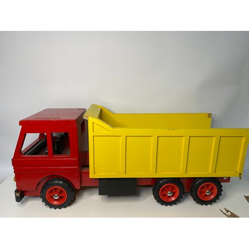 655 - Large red and yellow wooden toy dump truck, 70x30cms