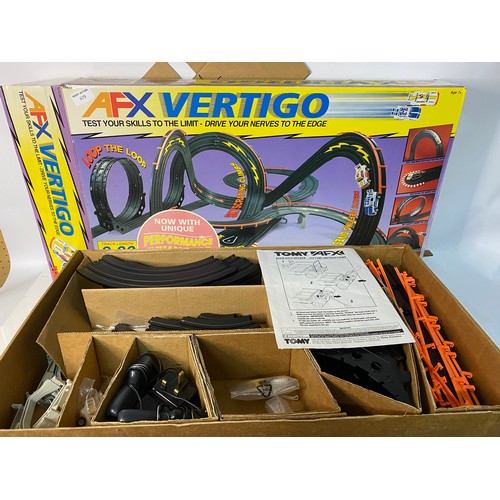 679 - Tomy AFX Vertigo boxed racing set