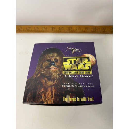 716 - Star Wars CCG, Customizable card Game, A New Hope Revised Edition made in 1998. 14 packets sealed ne... 