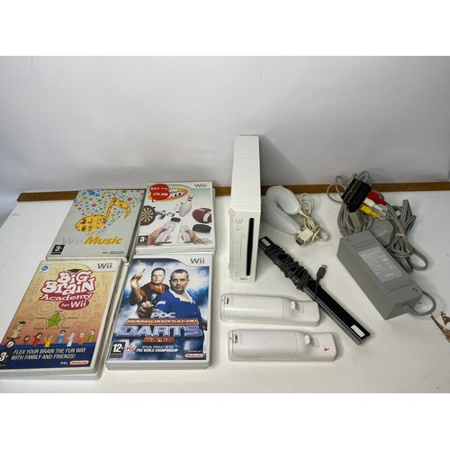 752 - Nintendo Wii console with 2 controllers/nunchucks and 9 games. Fully tested and working