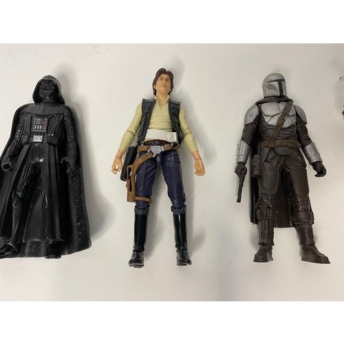 561 - Assortment of Star Wars figures including Darth Vader, Hans Solo, Mandalorian Beshor and some vehicl... 