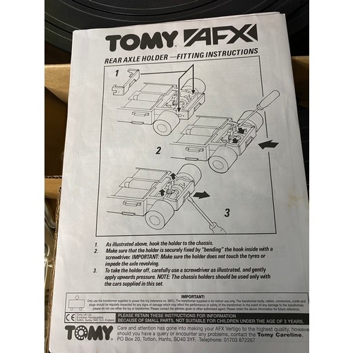 679 - Tomy AFX Vertigo boxed racing set