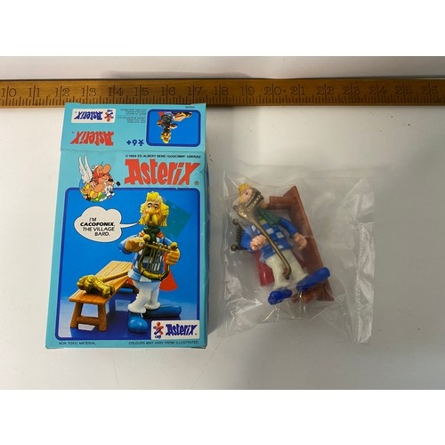 722 - Vintage Play Asterix, boxed complete Cacofonix. Figure is sealed new condition in packaging. Made by... 