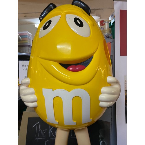 677 - Large shop display M&M's character on wheels. 95cms tall