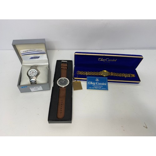 756 - Collection of 3 x boxed watches, an AWG sports watch, an Oleg Cassini and an Eaglemoss watch