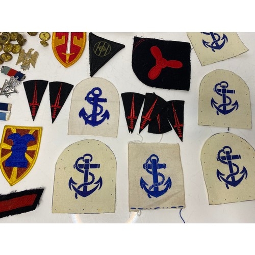 567 - Collection of Military badges and patches.