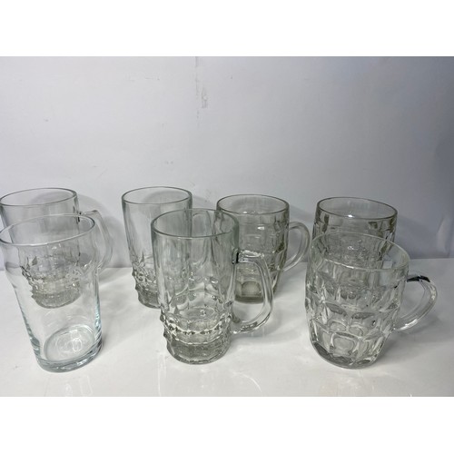 106 - Selection of pint glasses and advertising glasses