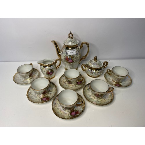 108 - 15 piece decorative coffee set comprising coffee pot, milk jug, sugar bowl and 6 cups and saucers