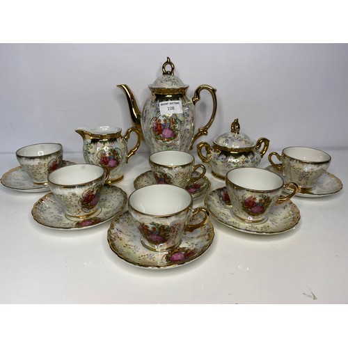 108 - 15 piece decorative coffee set comprising coffee pot, milk jug, sugar bowl and 6 cups and saucers