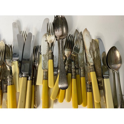 124 - Selection of old cutlery including fish knives and forks, spoons and decorative spoons.