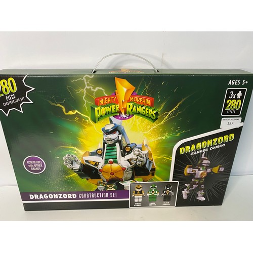 137 - Power Rangers Dragonzord construction set and 2 Battle Bike construction sets.