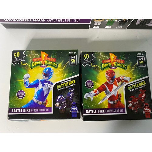 137 - Power Rangers Dragonzord construction set and 2 Battle Bike construction sets.