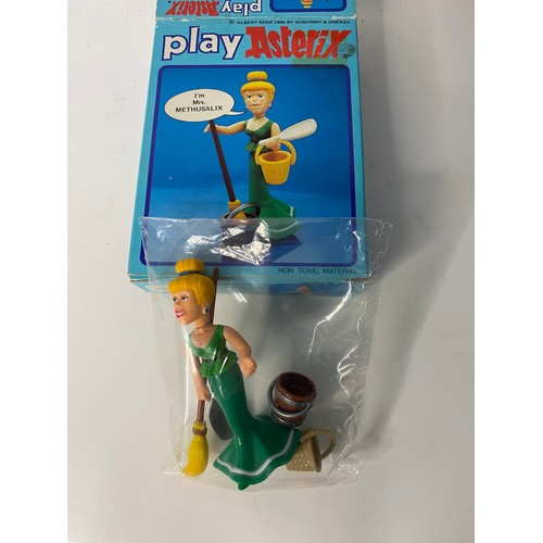 250 - Vintage Play Asterix, Mrs Methusalix boxed complete figure. Sealed in original packaging it is in mi... 