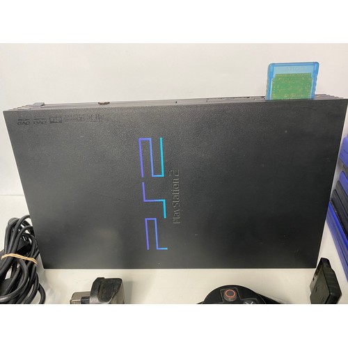 176 - PS2 console with 2 controllers, memory card and 15 games. Fully tested and working