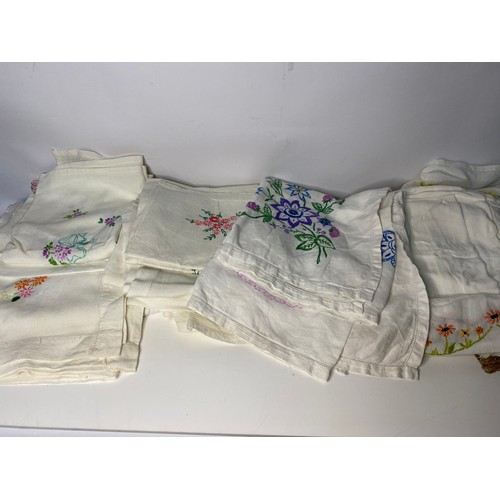 181 - Large selection of vintage tablecloths and linen.