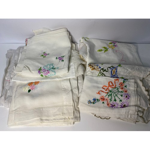 181 - Large selection of vintage tablecloths and linen.