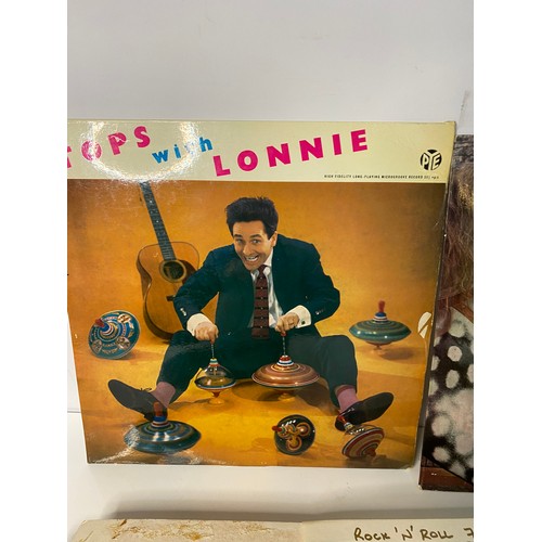 197 - 2 autographed LP's by Lonnie Donegan and a selection of 78rpm's from the Rock 'n' Roll era.