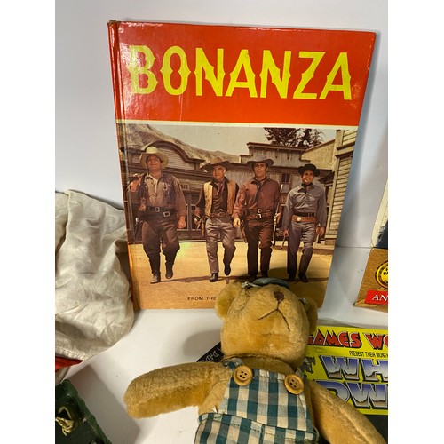 204 - Assortment of vintage toys, dolls and Bonanza annual.