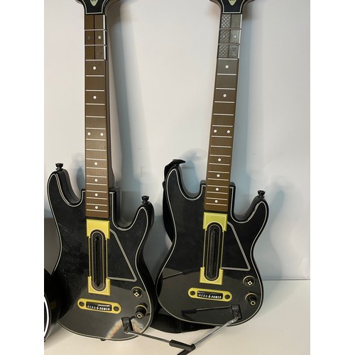 208 - 3 Guitar Heroes guitars.