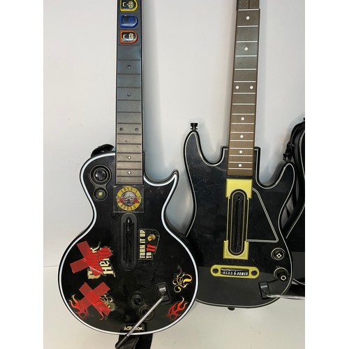 208 - 3 Guitar Heroes guitars.