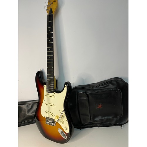 231 - Falcon electric guitar in carry case.