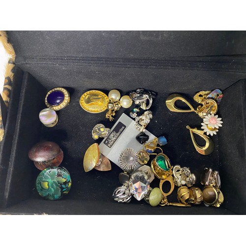 233 - Box of approximately 55 pairs of clip-on ear-rings in a mix of modern and vintage.