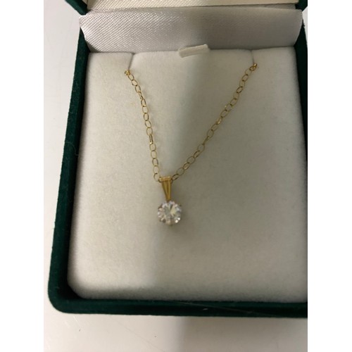 299 - 9ct Gold necklace with small crystal pendant.