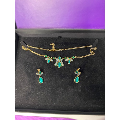 451 - Gold Plated necklace, ring and bracelet set with blue stones and crystals. Also gold plated necklace... 