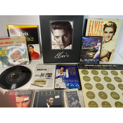 177 - Selection of Elvis memorabilia including records, CD's and books.