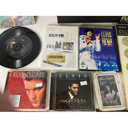 177 - Selection of Elvis memorabilia including records, CD's and books.