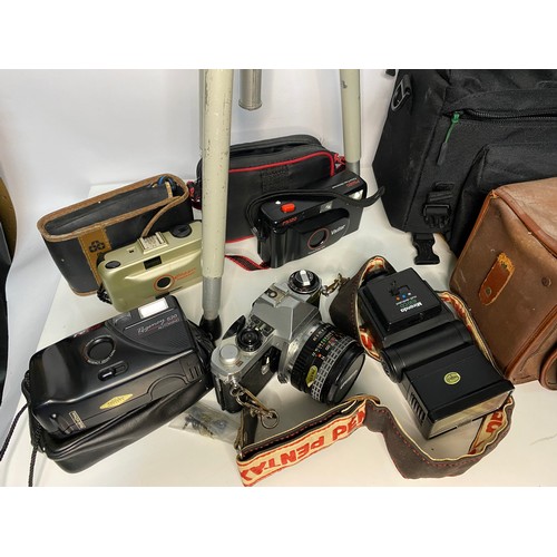 281 - Selection of vintage cameras and accessories including Pentax ME super, various lenses and a Velbon ... 