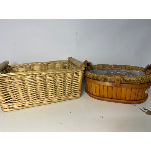 283 - Selection of wicker baskets including a bottle basket with carry handle.