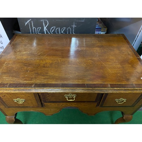 356 - Oak lowboy with Mahogany crossbanding on cabriole legs measuring 105 x 62 x 68 cms tall