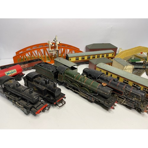 71 - Selection of model railway engines, carriages, buildings and track from Hornby and Triang .