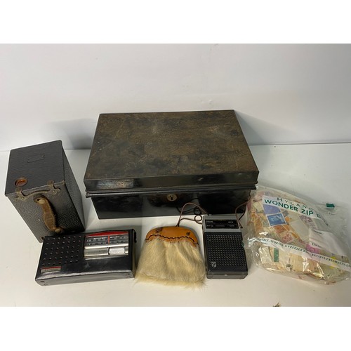 408 - Metal box with 2 radios, old camera, and selection of stamps.