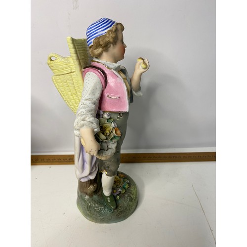 200 - Boy and girl figurine spill holders measuring 25 cms tall