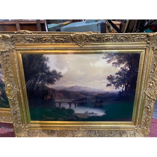 307 - Pair of framed landscape artwork under glass in gold ornate frame measuring 120 x 73 cms