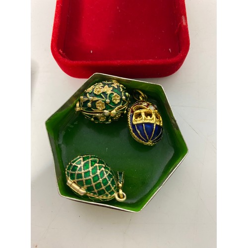 322 - 3 Guilloche enamel and crystal egg pendants of which 2 are stamped F.E. with a vintage enamel box