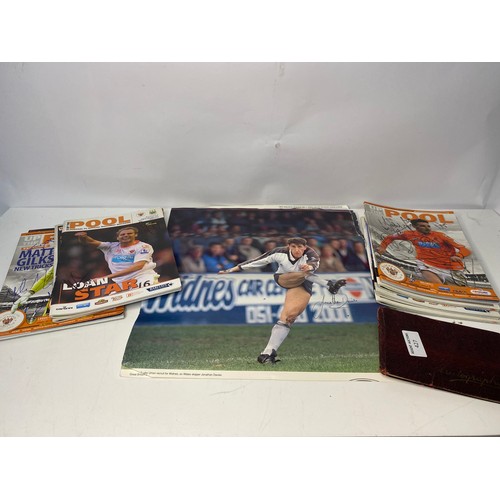 427 - Selection of autographed pictures, programmes and an autograph book