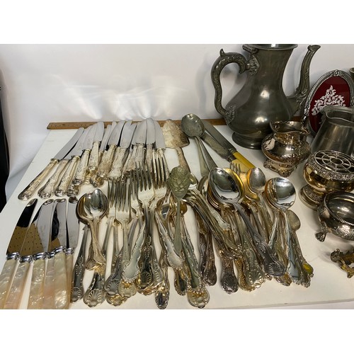 320 - Box of assorted silver plate and pewter including a quantity of cutlery.