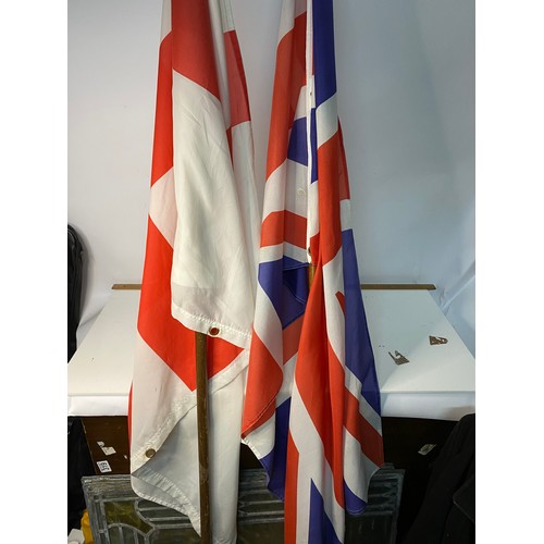 351 - 2 x large Union Jack and St Georges flags on poles measuring approx 145 x 90 cms